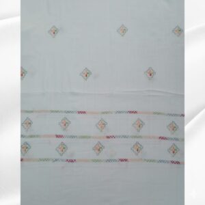 Full view of white wool embroidered shawl displayed open with geometric motifs